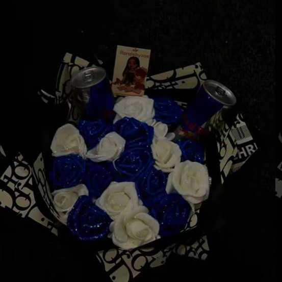 Blue and white bouquet with Red Bull cans